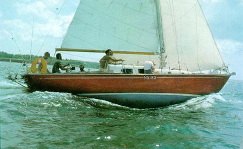 Image of a sailboat at maximum hull speed, clearly showing the bow and stern waves
