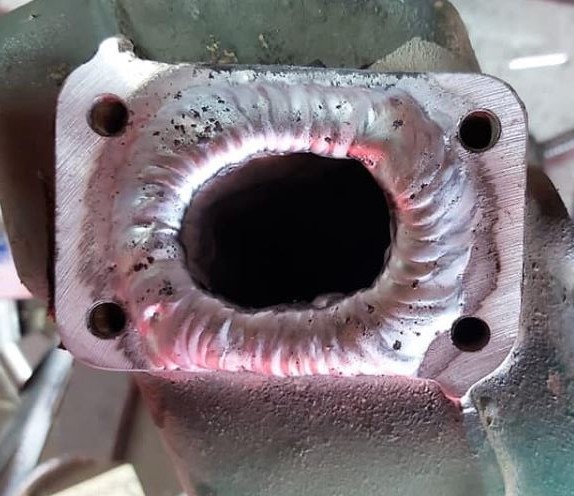 Image showing the heat exchanger where the wall has been built up with aluminum weld